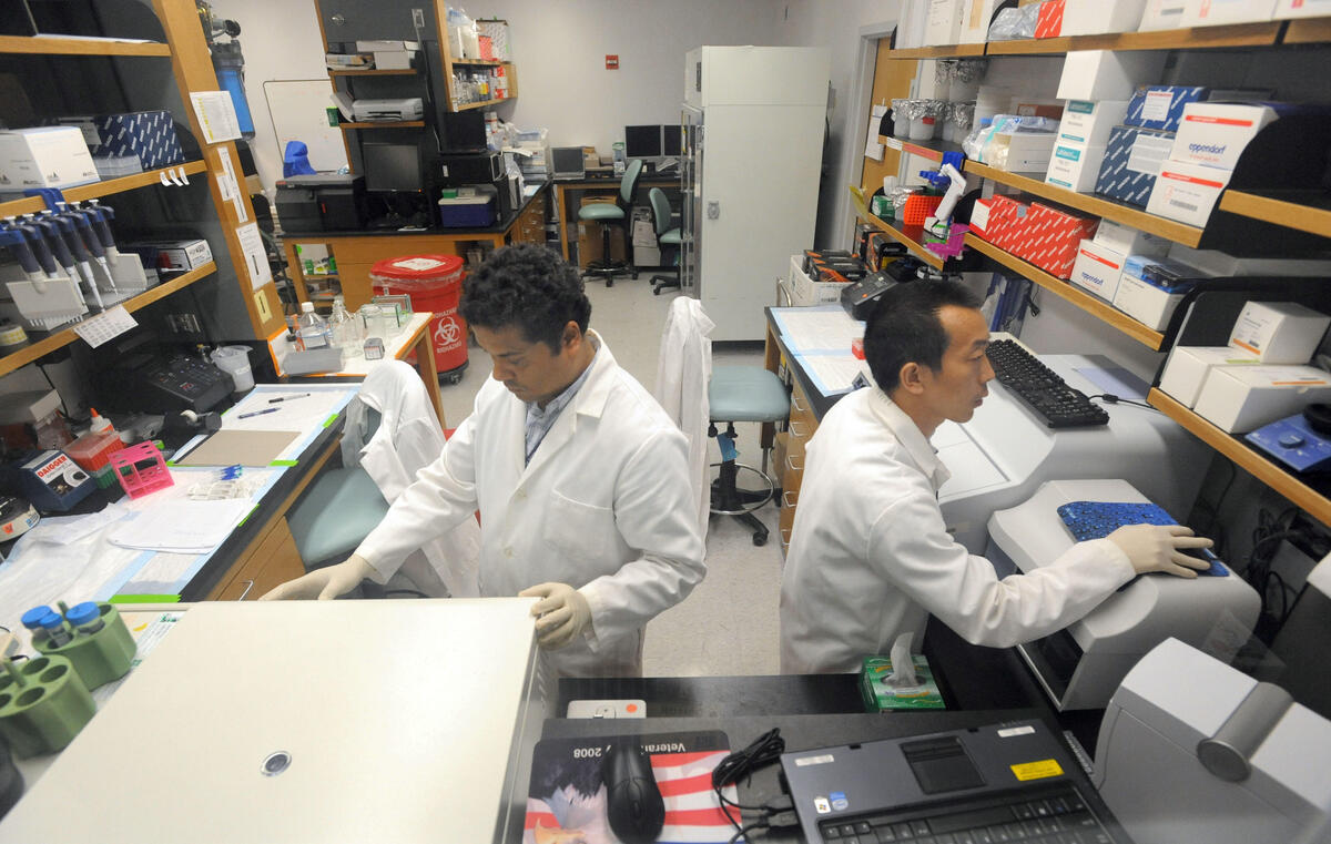 CDC Scientist working in lab, 2009