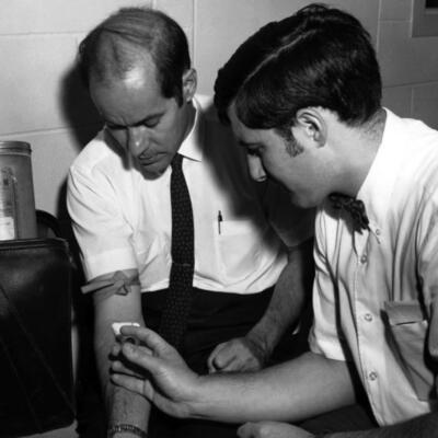 Dr. Steven R. Mostow collecting blood, 1968